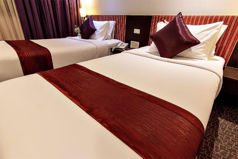 Bossotel Bangkok Zimmer foto